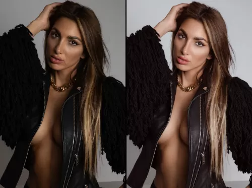 Девушка с длинными волосами в черной кожаной куртке с фактурными рукавами и массивным золотым колье